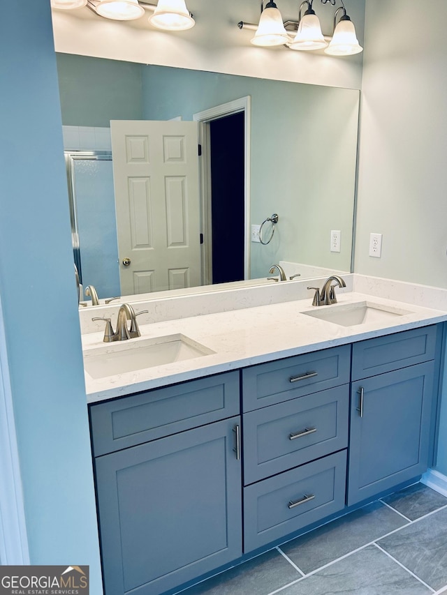 6605 New Ridge Ct, Cumming, GA 30041 - full bath featuring tile patterned flooring, a stall shower, and double vanity
