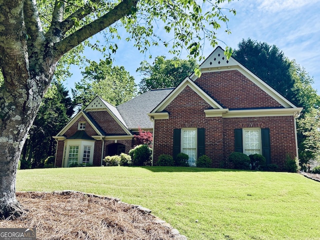 6605 New Ridge Ct, Cumming, GA 30041 - view of front of home with brick siding and a front yard