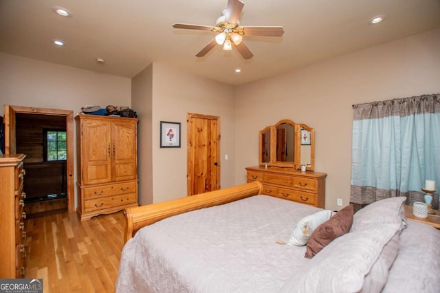 bedroom featuring light wood-style flooring, recessed lighting, and ceiling fan