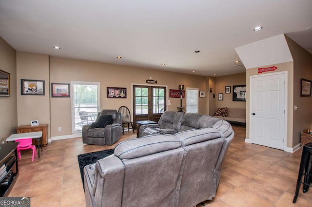living room featuring recessed lighting, light tile patterned floors, and baseboards