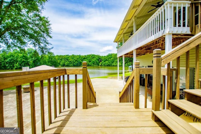 wooden deck with a water view