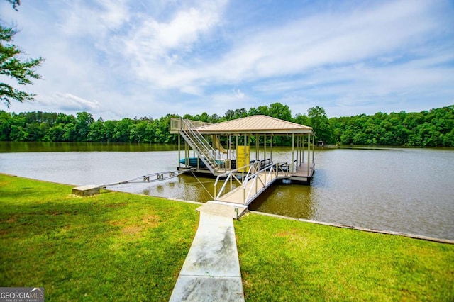 dock featuring boat lift, a water view, a yard, and a forest view