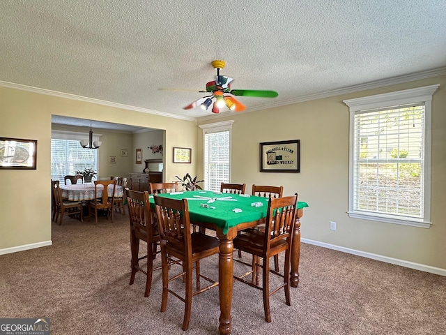 6940 Treeline Dr, Cumming, GA 30028 - carpeted dining room featuring plenty of natural light, a textured ceiling, ornamental molding, a ceiling fan, and baseboards