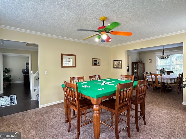 6940 Treeline Dr, Cumming, GA 30028 - dining space with carpet, ornamental molding, a textured ceiling, ceiling fan, and a chandelier