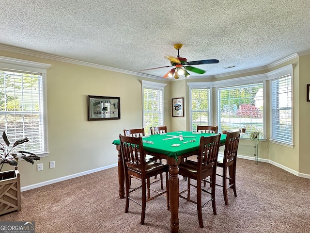 6940 Treeline Dr, Cumming, GA 30028 - dining area featuring crown molding, plenty of natural light, carpet, a textured ceiling, and a ceiling fan