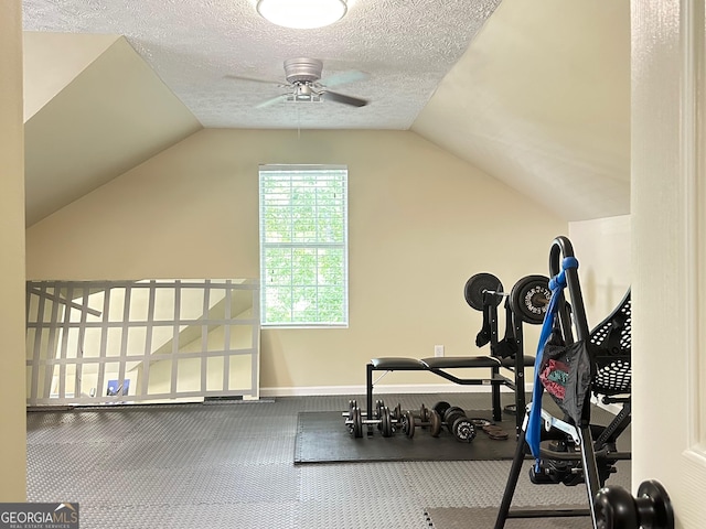6940 Treeline Dr, Cumming, GA 30028 - exercise room with a ceiling fan, vaulted ceiling, carpet flooring, a textured ceiling, and baseboards