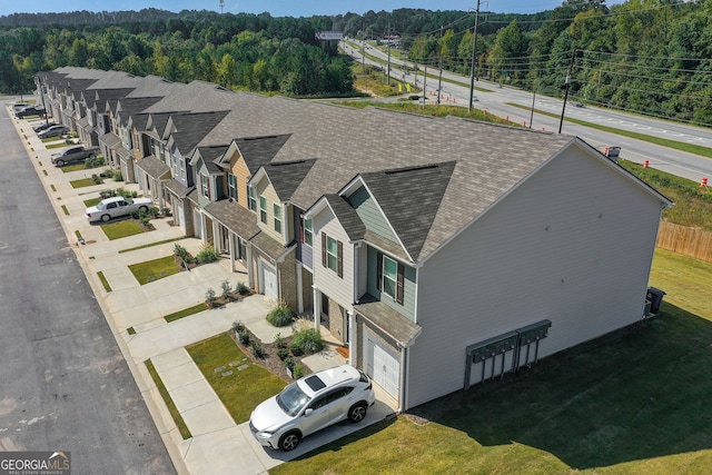 8747 Lakeview Commons Lot 1, Jonesboro, GA 30238 - aerial view of property and surrounding area with a forest