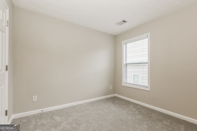 11576 Kades Trl, Hampton, GA 30228 - empty room featuring carpet and baseboards