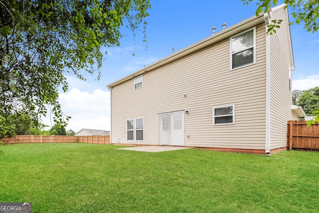 11576 Kades Trl, Hampton, GA 30228 - back of house featuring a patio