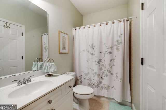 bathroom featuring vanity, tile patterned flooring, toilet, and a shower with shower curtain