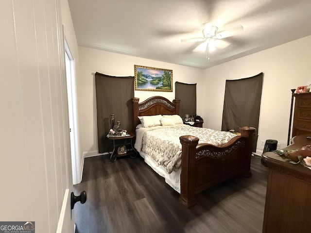 214 Evans St, Athens, GA 30606 - bedroom featuring dark wood finished floors, ceiling fan, and baseboards