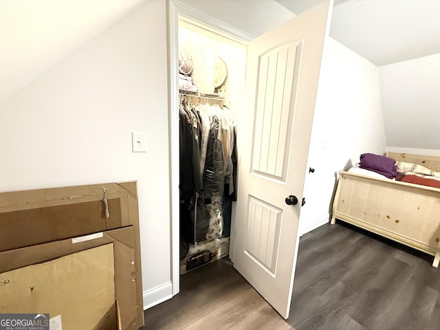 214 Evans St, Athens, GA 30606 - bedroom with dark wood finished floors, baseboards, a closet, and a spacious closet