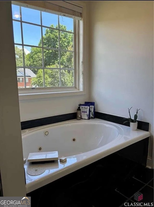 238 Covington Pl, Athens, GA 30606 - bathroom featuring plenty of natural light and a jetted tub