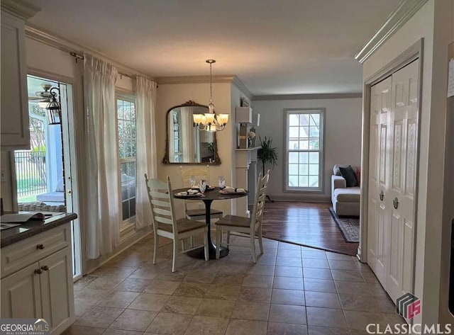 238 Covington Pl, Athens, GA 30606 - dining area with a chandelier and crown molding