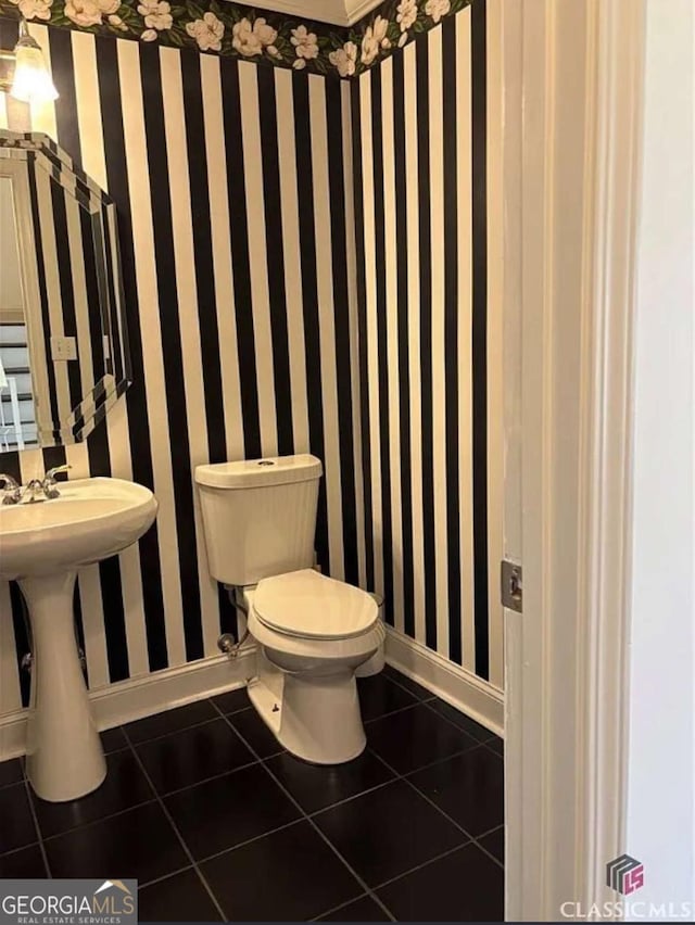 238 Covington Pl, Athens, GA 30606 - bathroom with wallpapered walls and tile patterned floors