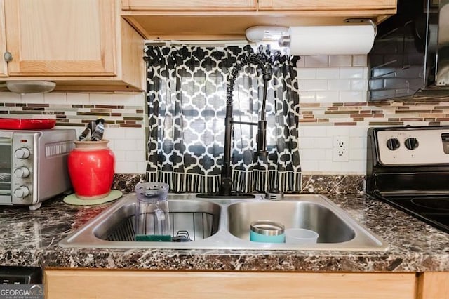 50 Canyon Pass, Cleveland, GA 30528 - kitchen view of tasteful backsplash, dark countertops, stainless steel range with electric stovetop, light brown cabinetry, and a sink