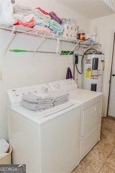 50 Canyon Pass, Cleveland, GA 30528 - laundry room featuring washer and dryer, water heater, and light tile patterned floors