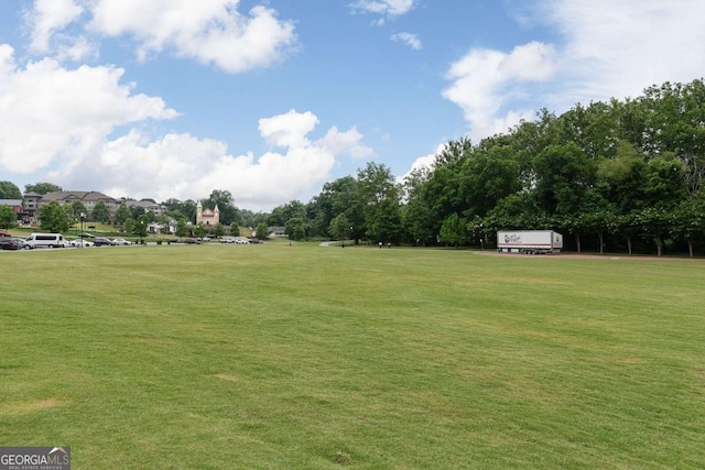 surrounding community featuring a lawn