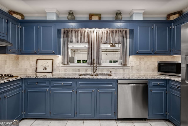 5401 Rosser Rd, Tucker, GA 30087 - kitchen with stainless steel appliances, blue cabinets, light stone counters, crown molding, and tasteful backsplash