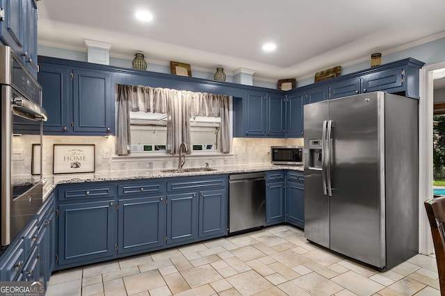 5401 Rosser Rd, Tucker, GA 30087 - kitchen with stainless steel appliances, blue cabinets, ornamental molding, tasteful backsplash, and light stone countertops