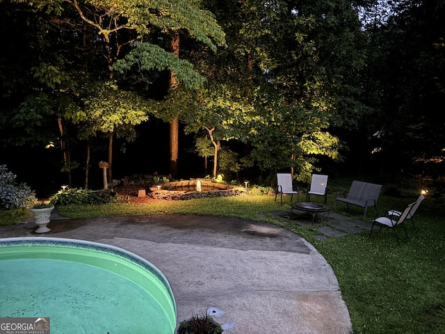 5401 Rosser Rd, Tucker, GA 30087 - view of pool featuring an outdoor fire pit, a patio, and a yard