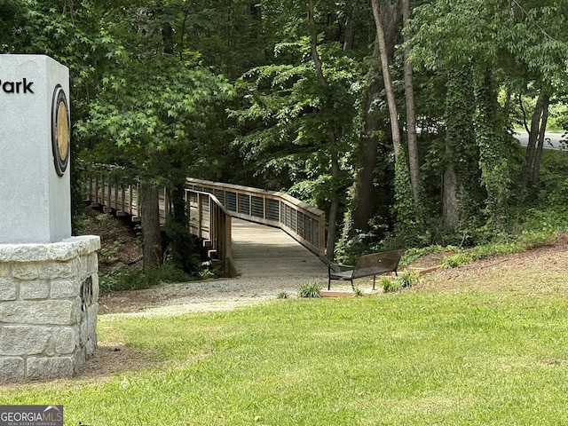 5401 Rosser Rd, Tucker, GA 30087 - view of community with a lawn