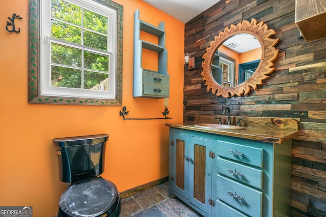 4624 Park Dr, Pine Lake, GA 30072 - bathroom with wooden walls, baseboards, vanity, and wine cooler