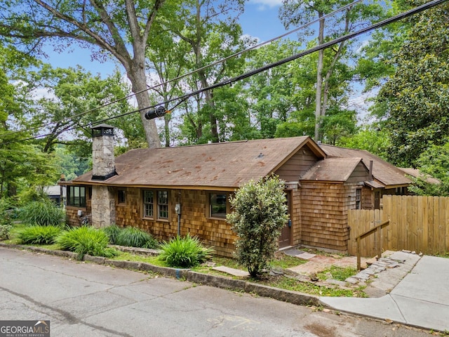 4624 Park Dr, Pine Lake, GA 30072 - view of front facade with a chimney
