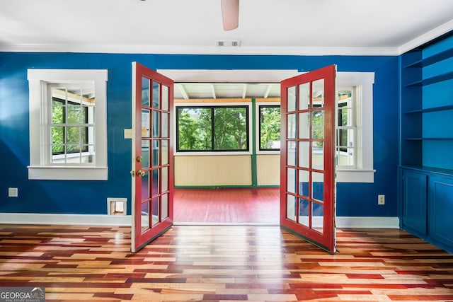4624 Park Dr, Pine Lake, GA 30072 - unfurnished room with french doors, wood finished floors, baseboards, crown molding, and built in features