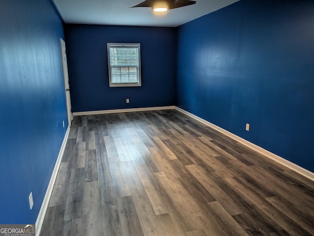 5700 Miles Rd, South Fulton, GA 30349 - unfurnished room featuring a ceiling fan, dark wood finished floors, and baseboards