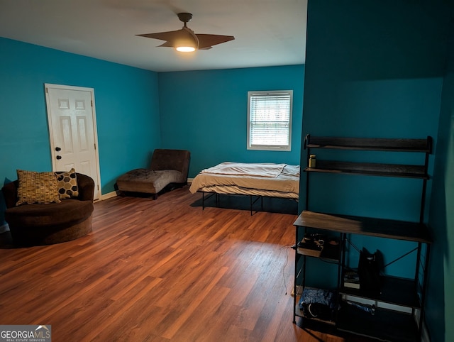 5700 Miles Rd, South Fulton, GA 30349 - bedroom with wood finished floors and a ceiling fan