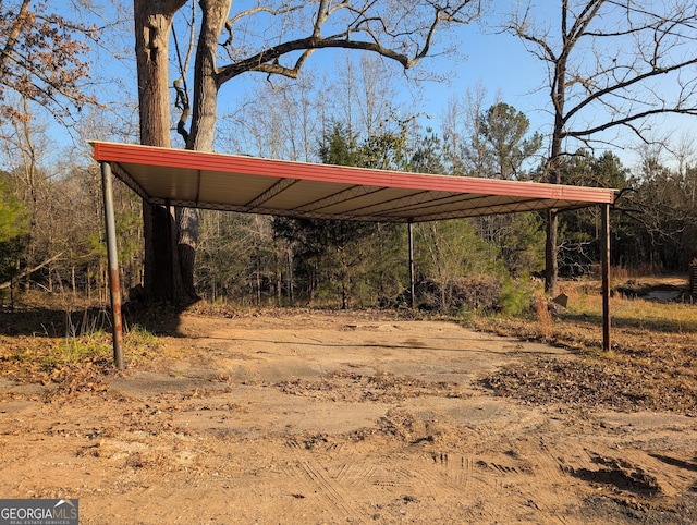 5700 Miles Rd, South Fulton, GA 30349 - view of car parking featuring a carport