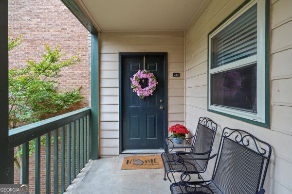 212 Brittany Ct, Duluth, GA 30096 - view of exterior entry featuring brick siding