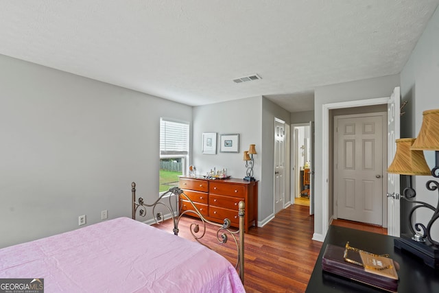 212 Brittany Ct, Duluth, GA 30096 - bedroom with wood finished floors and baseboards