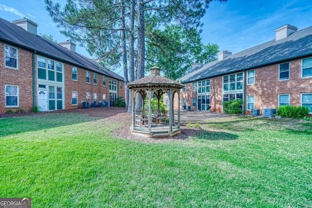 212 Brittany Ct, Duluth, GA 30096 - view of green lawn featuring a gazebo and central AC unit