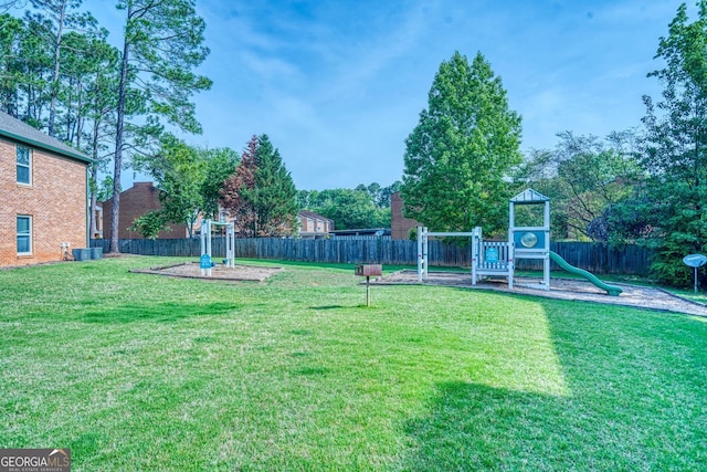 212 Brittany Ct, Duluth, GA 30096 - view of yard featuring central AC