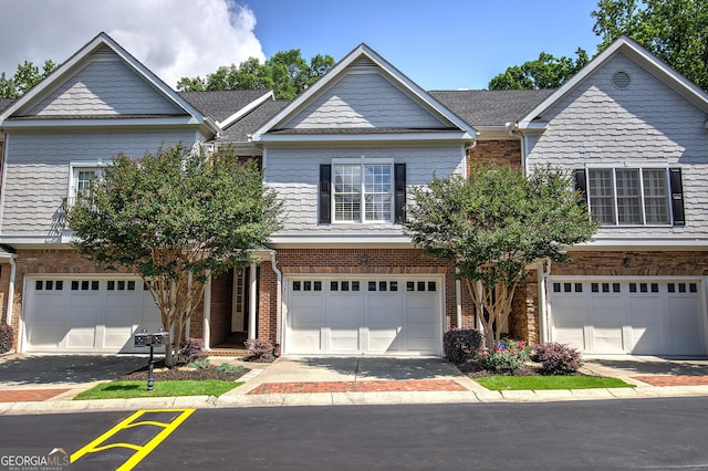 5492 Glenridge Dr Unit 536, Atlanta, GA 30342 - view of front of property featuring a garage and brick siding