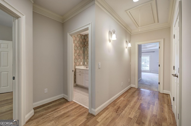 5492 Glenridge Dr Unit 536, Atlanta, GA 30342 - hall featuring attic access, ornamental molding, light wood-style flooring, and baseboards