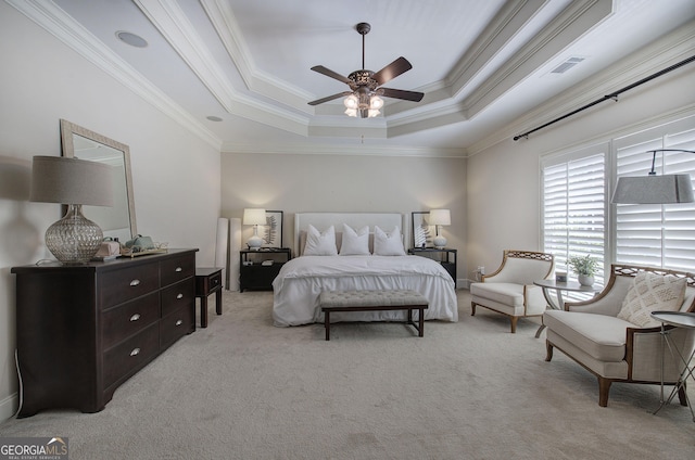 5492 Glenridge Dr Unit 536, Atlanta, GA 30342 - carpeted bedroom with crown molding, a raised ceiling, and ceiling fan