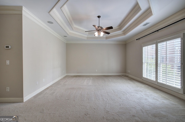 5492 Glenridge Dr Unit 536, Atlanta, GA 30342 - empty room with carpet floors, ceiling fan, crown molding, a raised ceiling, and baseboards