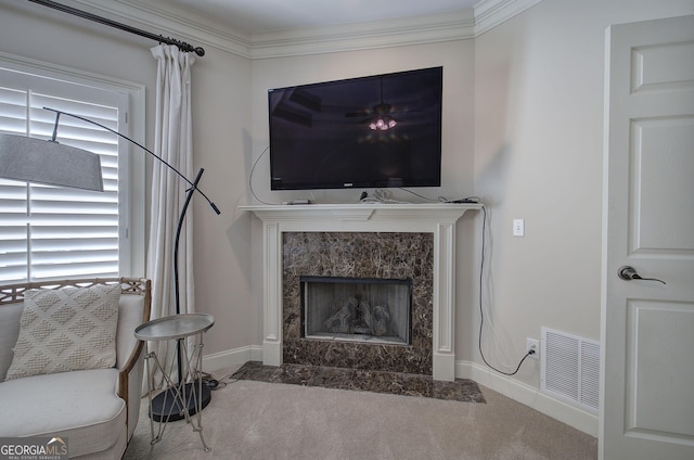 5492 Glenridge Dr Unit 536, Atlanta, GA 30342 - carpeted living room featuring a high end fireplace, baseboards, healthy amount of natural light, and ornamental molding