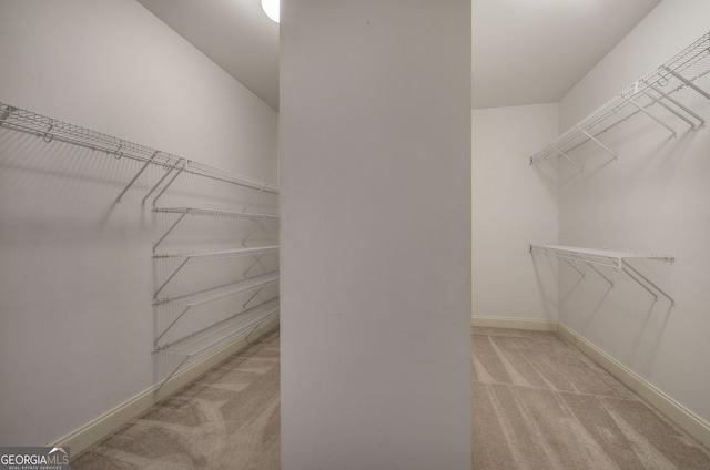 5492 Glenridge Dr Unit 536, Atlanta, GA 30342 - walk in closet with light colored carpet