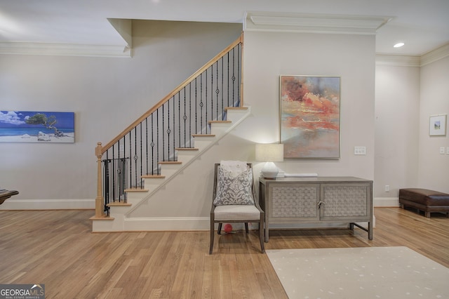 5492 Glenridge Dr Unit 536, Atlanta, GA 30342 - staircase featuring ornamental molding, wood finished floors, baseboards, and recessed lighting