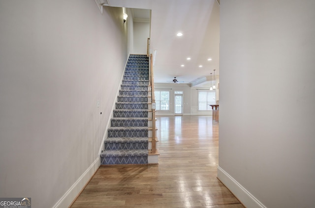 5492 Glenridge Dr Unit 536, Atlanta, GA 30342 - stairs featuring wood finished floors, baseboards, recessed lighting, and ceiling fan