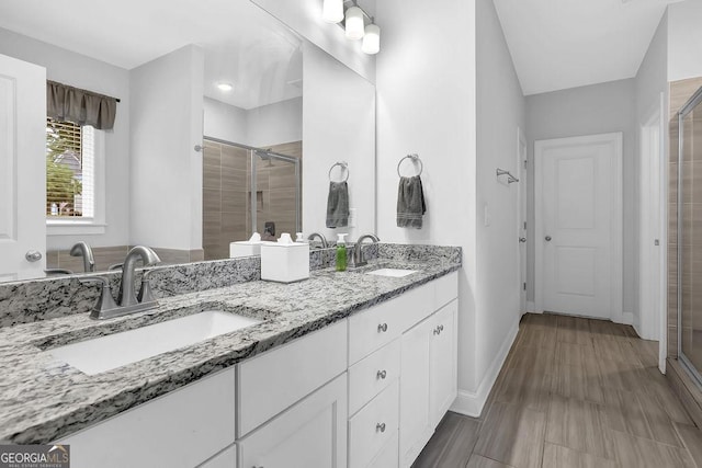 8745 Hightower Rdg, Ball Ground, GA 30107 - full bath featuring a shower stall, double vanity, and baseboards