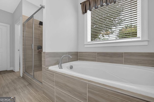 8745 Hightower Rdg, Ball Ground, GA 30107 - bathroom with a bath and a stall shower