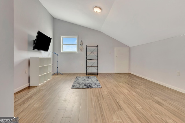 346 Rest Haven Rd, Thomaston, GA 30286 - additional living space with lofted ceiling, light wood-style floors, and baseboards