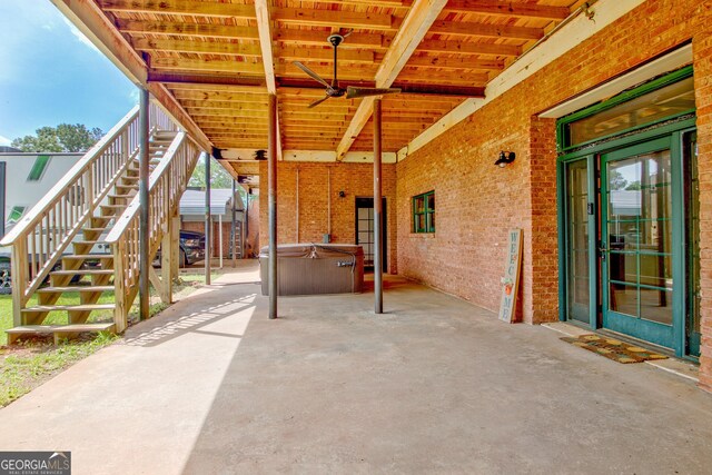 346 Rest Haven Rd, Thomaston, GA 30286 - view of patio / terrace featuring stairway and a hot tub