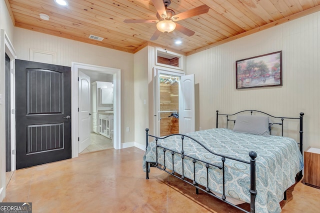 346 Rest Haven Rd, Thomaston, GA 30286 - bedroom featuring wood ceiling, recessed lighting, finished concrete flooring, ensuite bath, and baseboards