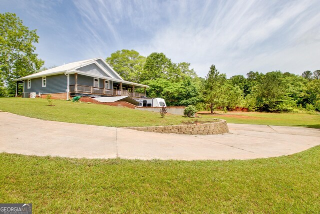 346 Rest Haven Rd, Thomaston, GA 30286 - view of front of property with a front lawn and a porch